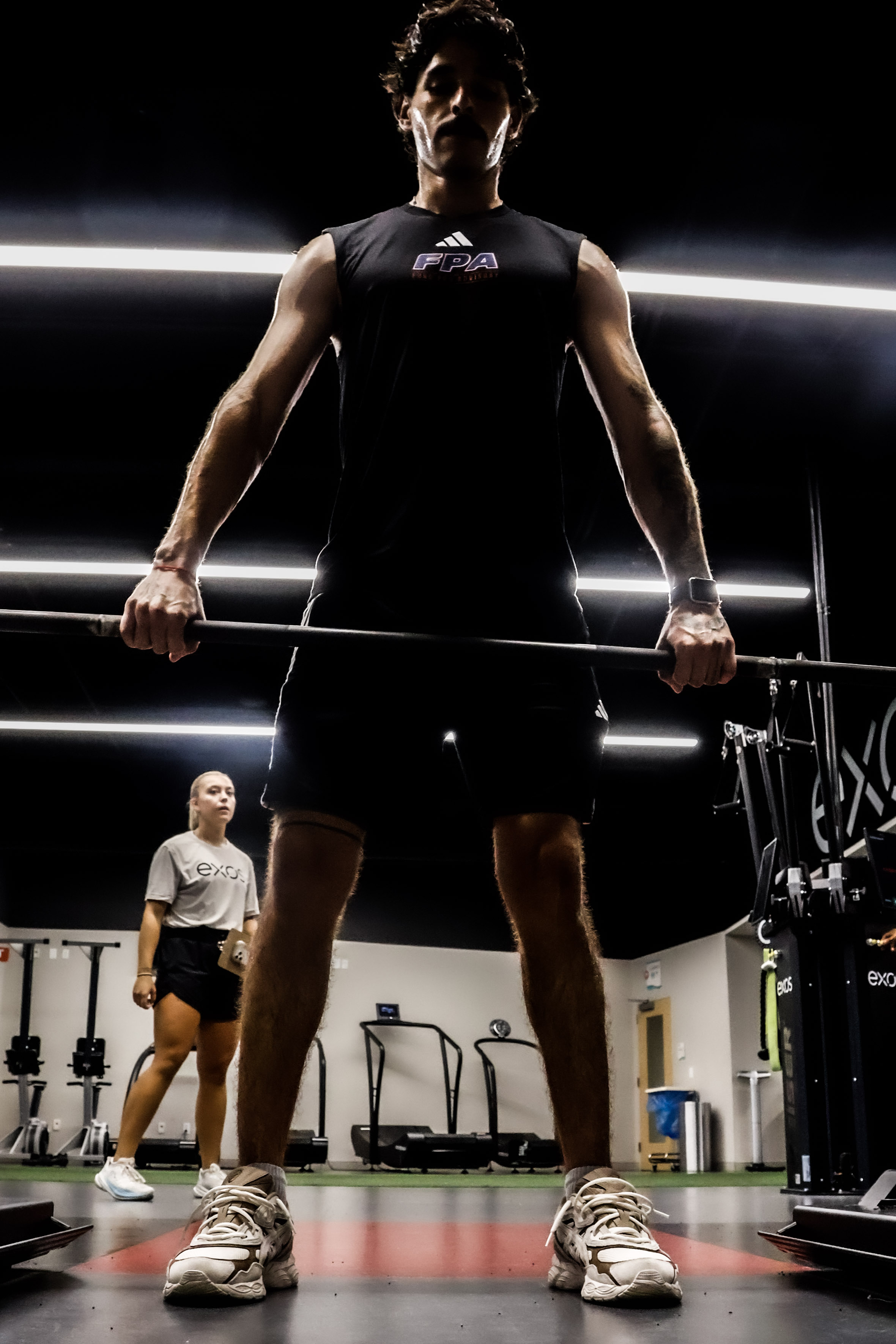 Athlete performing a barbell lift